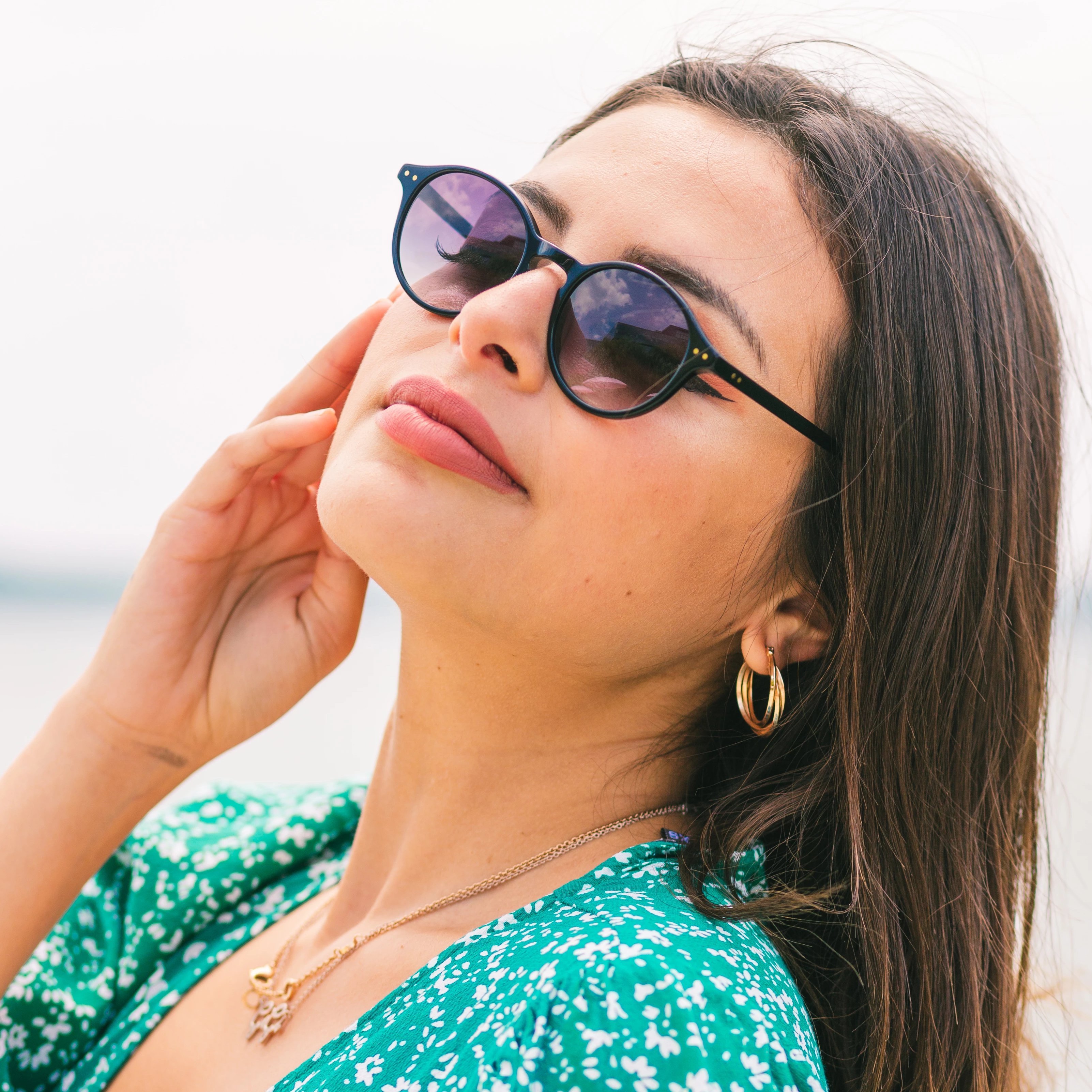 Woman wears Callula Co. petite sunglasses outside