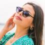 Woman wears Callula Co. petite sunglasses outside