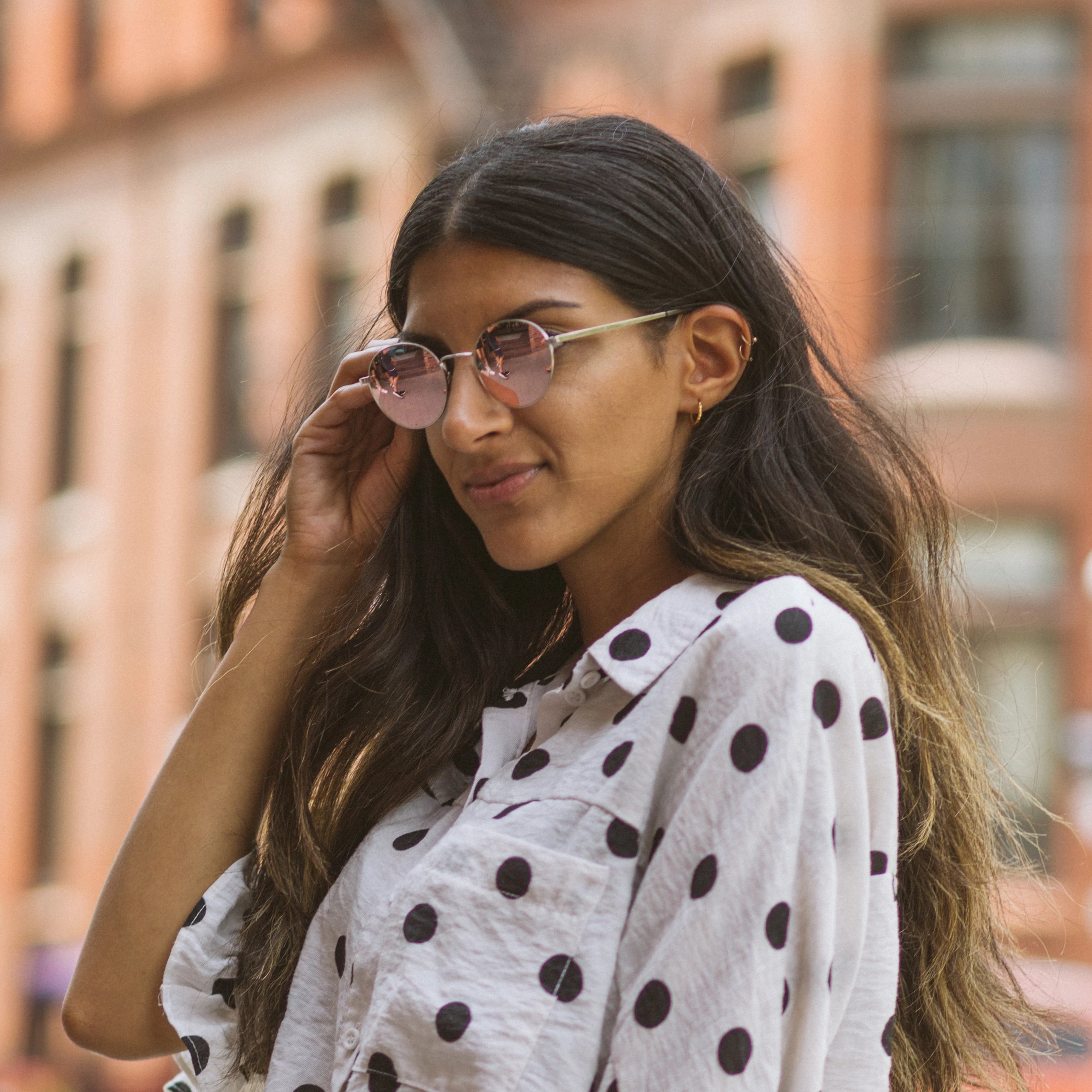 Woman wearing Callula Co. northern lights petite sunglasses 