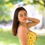 Woman wearing Callula Co. milky beige petite sunglasses