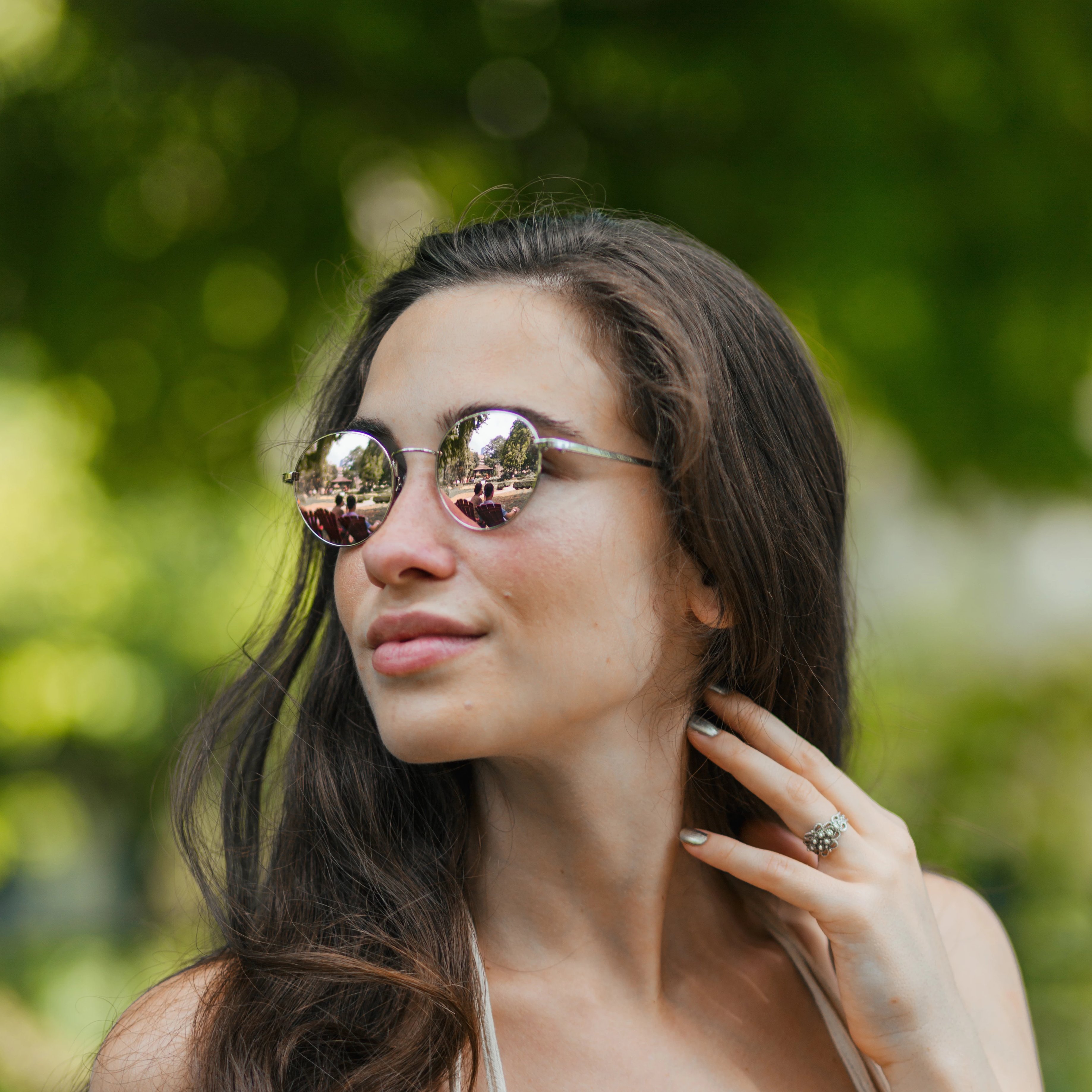 Woman wearing Callula Co. northern lights petite sunglasses